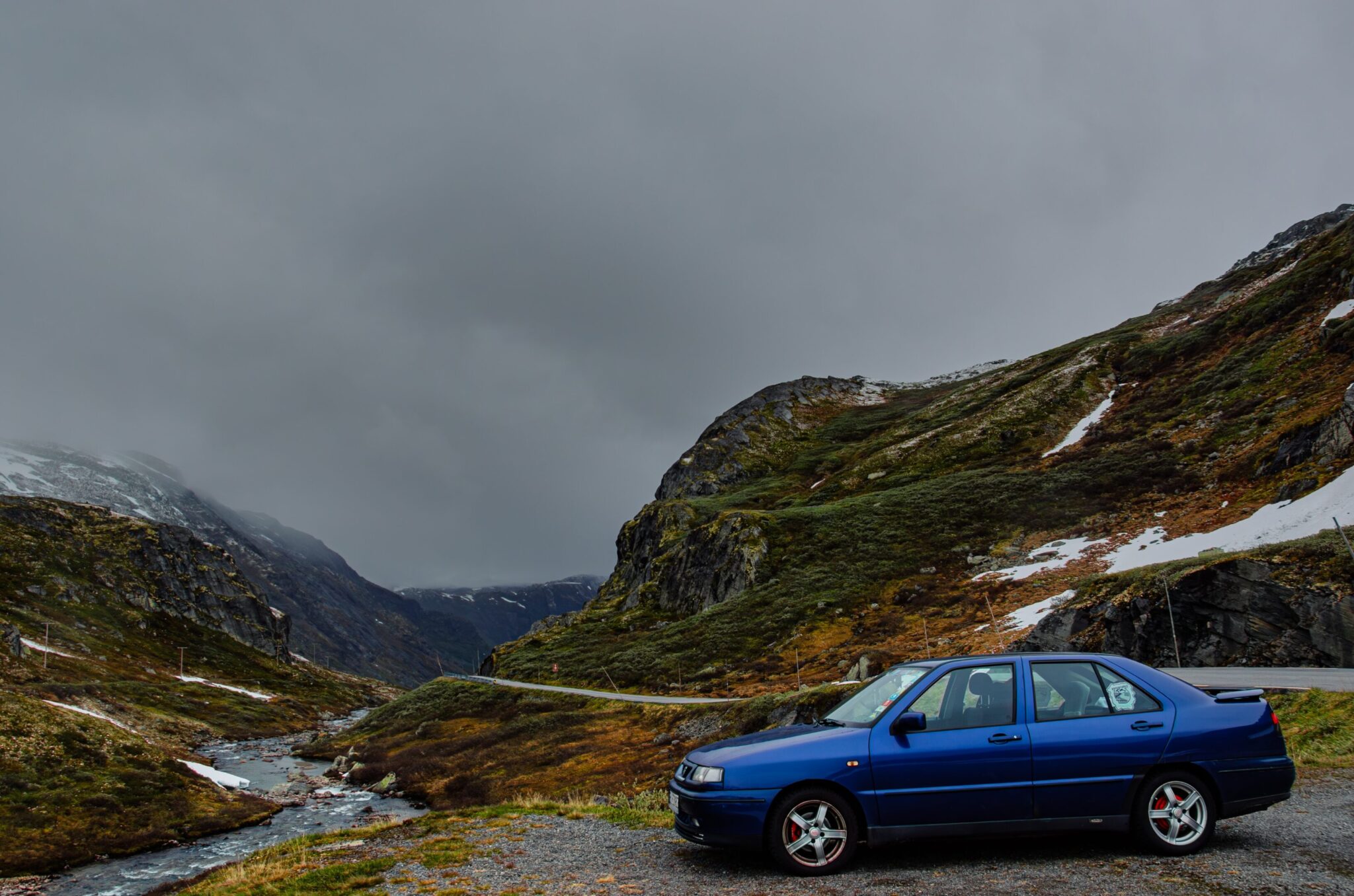 Seat Toledo in the parking lot by the road Sognefjellet