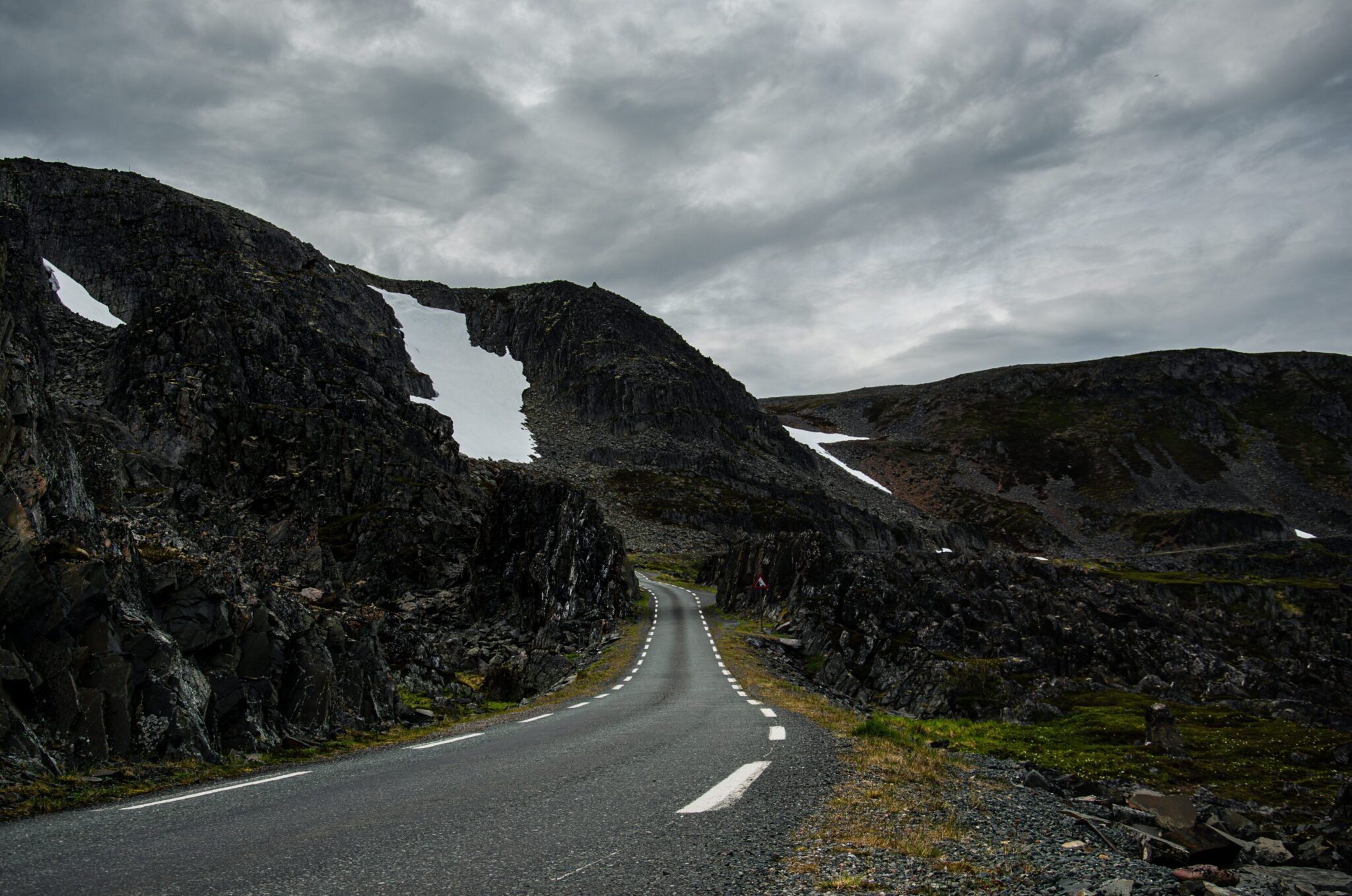 Varanger road and rocks and mountains