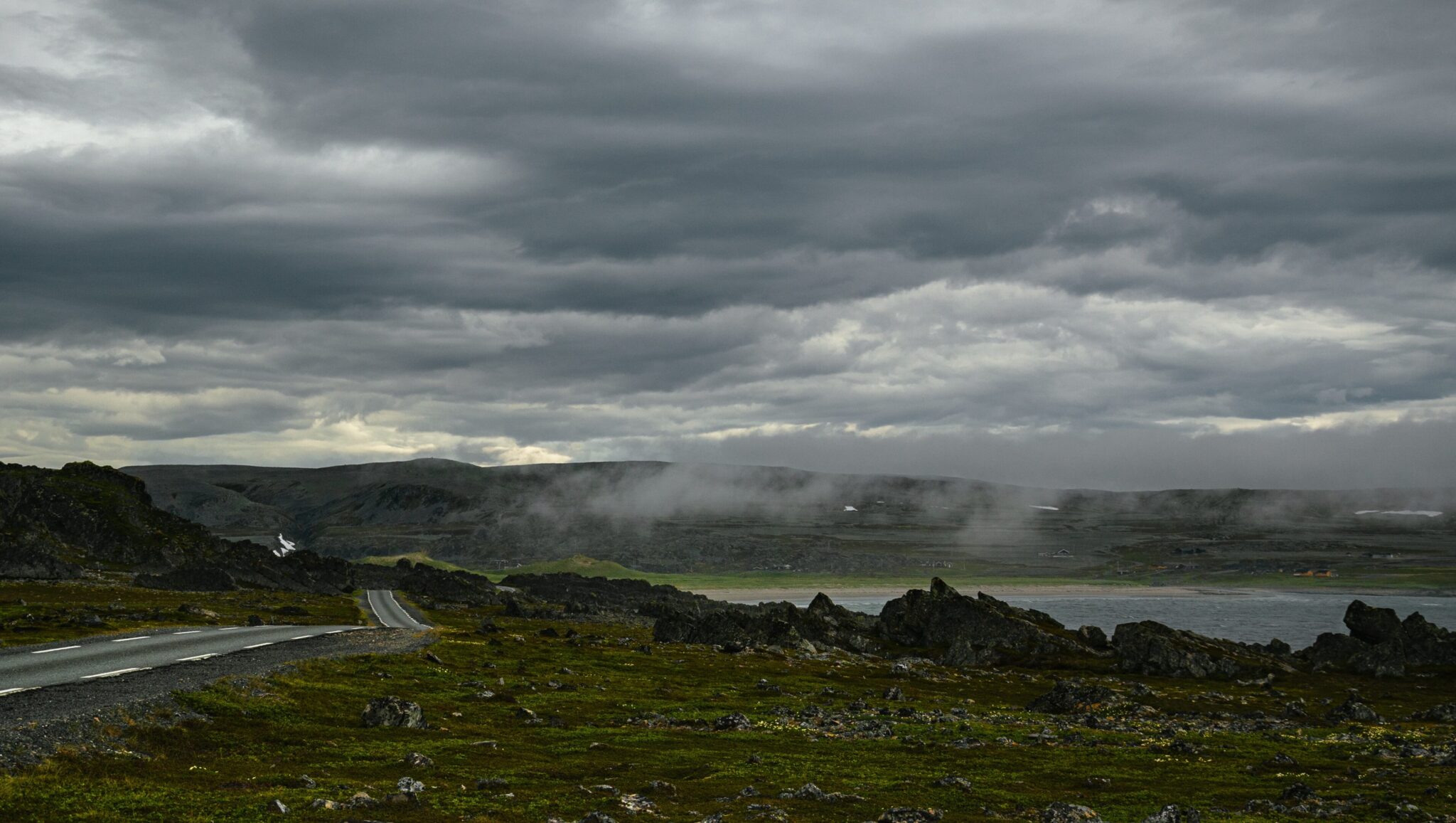 Varanger road and rocks and mountains